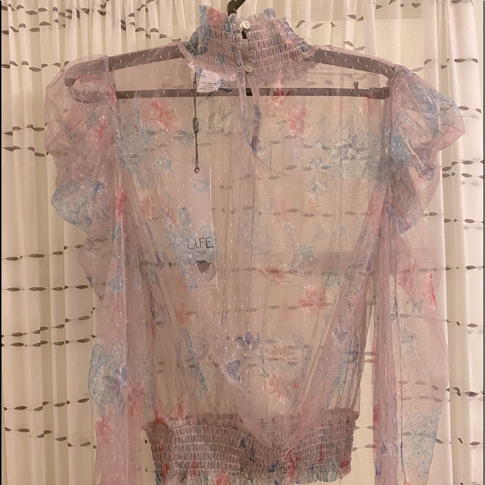 Sheer mauve lace pouf sleeve rouged turtle neck